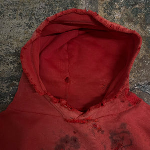 Sudadera con capucha reparada en rojo desteñido de los años 50